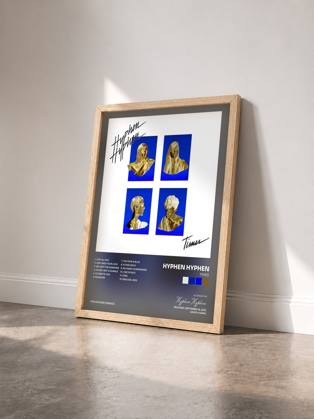 #bois Tableau de l'album Times de Hyphen Hyphen vu de trois quarts, cadre en bois brut