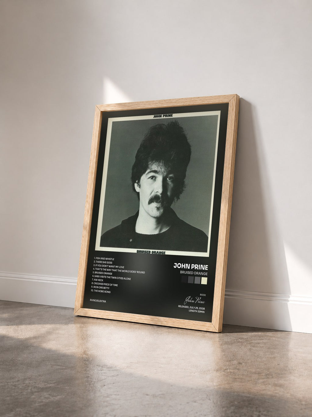 #bois Tableau de l'album Bruised Orange de John Prine vu de trois quarts, cadre en bois brut
