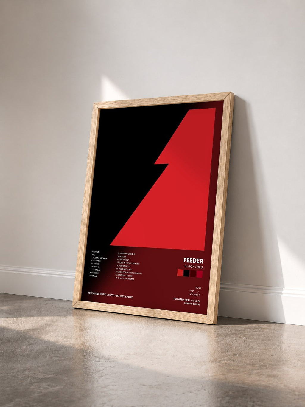 #bois Tableau de l'album Black / Red de Feeder vu de trois quarts, cadre en bois brut