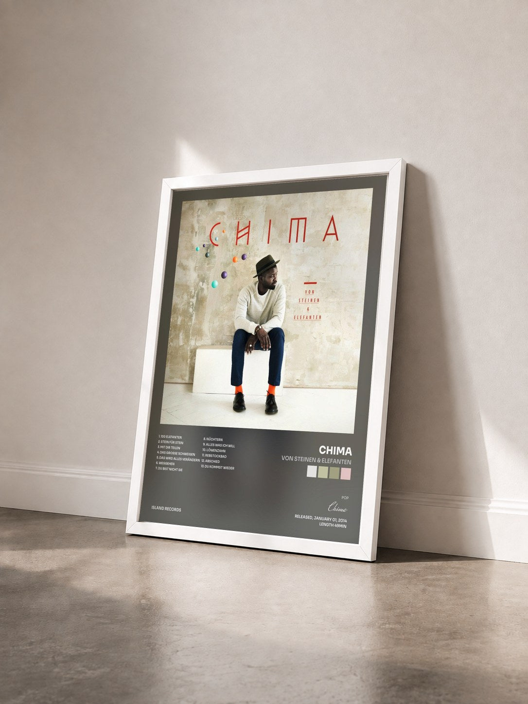 #blanc Tableau de l'album Von Steinen & Elefanten de Chima vu de trois quarts, cadre blanc