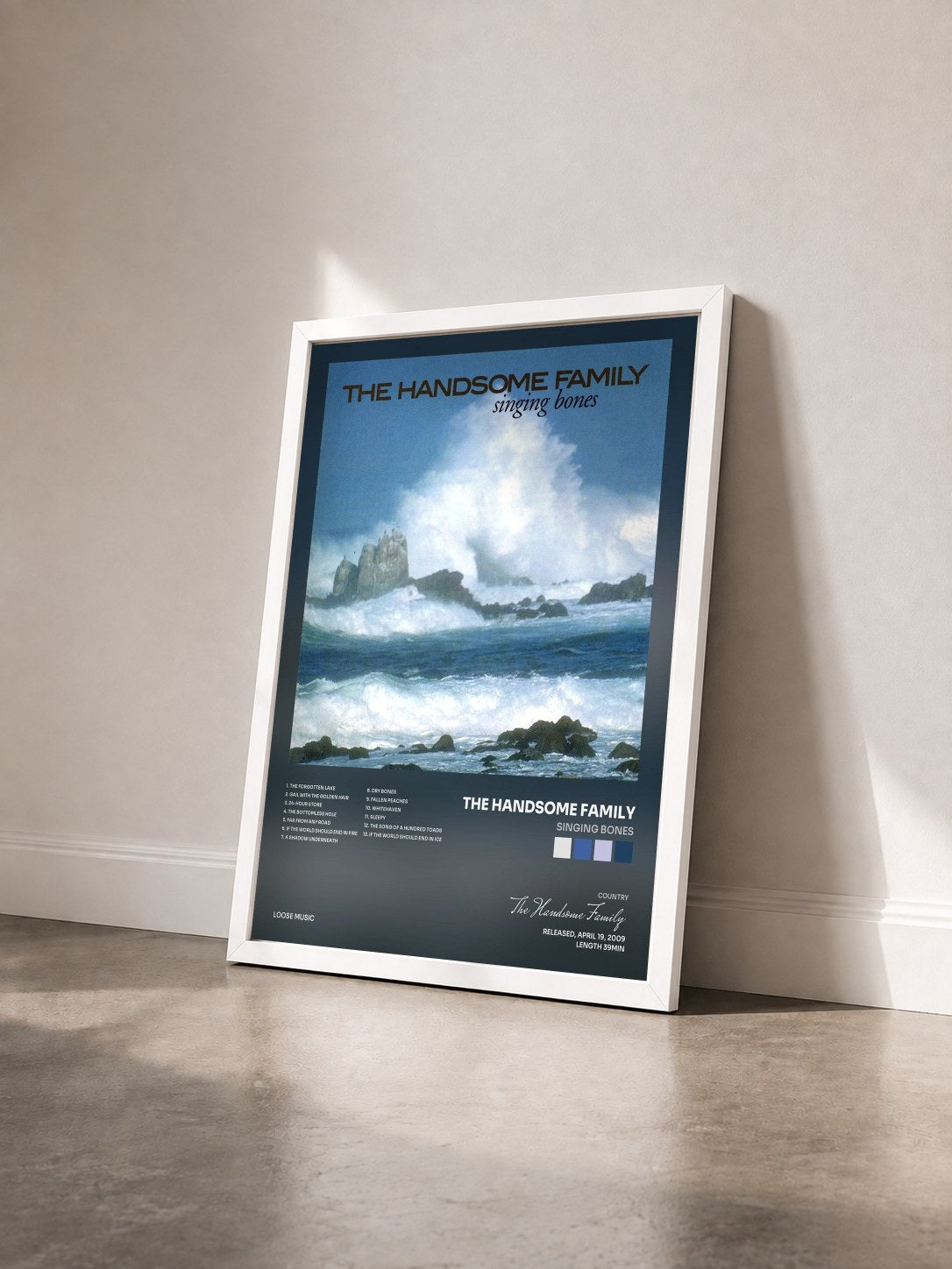 #blanc Tableau de l'album Singing Bones de The Handsome Family vu de trois quarts, cadre blanc