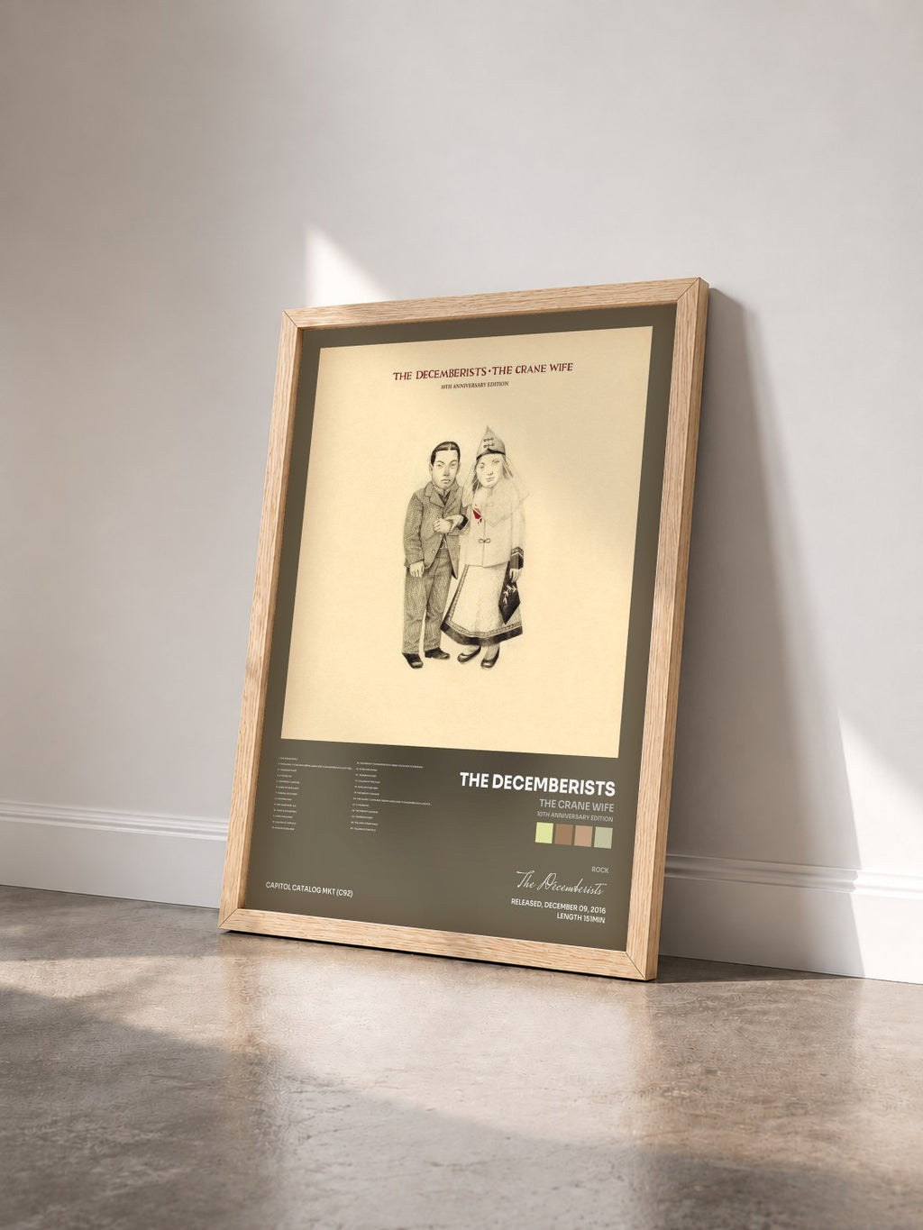 #bois Tableau de l'album The Crane Wife (10th Anniversary Edition) de The Decemberists vu de trois quarts, cadre en bois brut