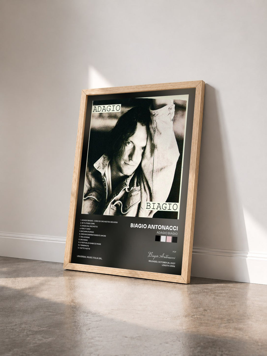 #bois Tableau de l'album Adagio Biagio de Biagio Antonacci vu de trois quarts, cadre en bois brut