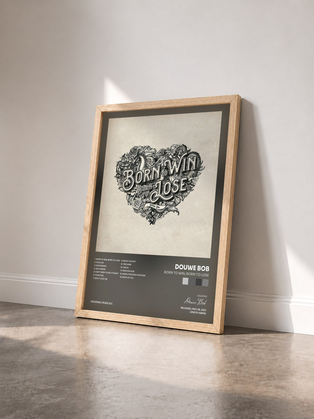 #bois Tableau de l'album Born To Win, Born To Lose de Douwe Bob vu de trois quarts, cadre en bois brut