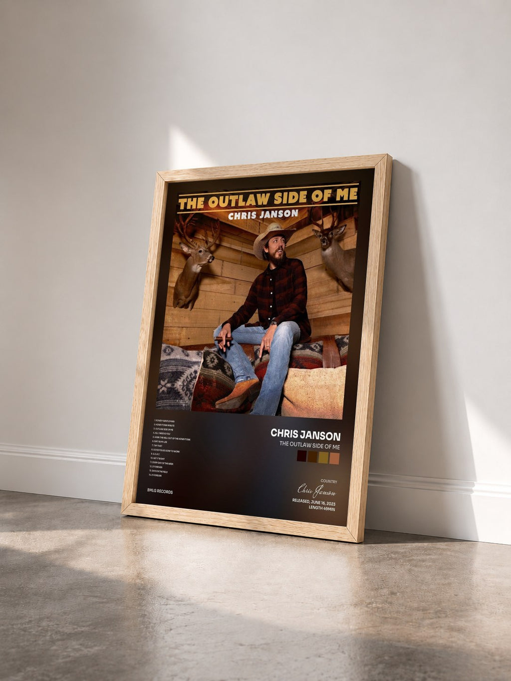 #bois Tableau de l'album The Outlaw Side Of Me de Chris Janson vu de trois quarts, cadre en bois brut