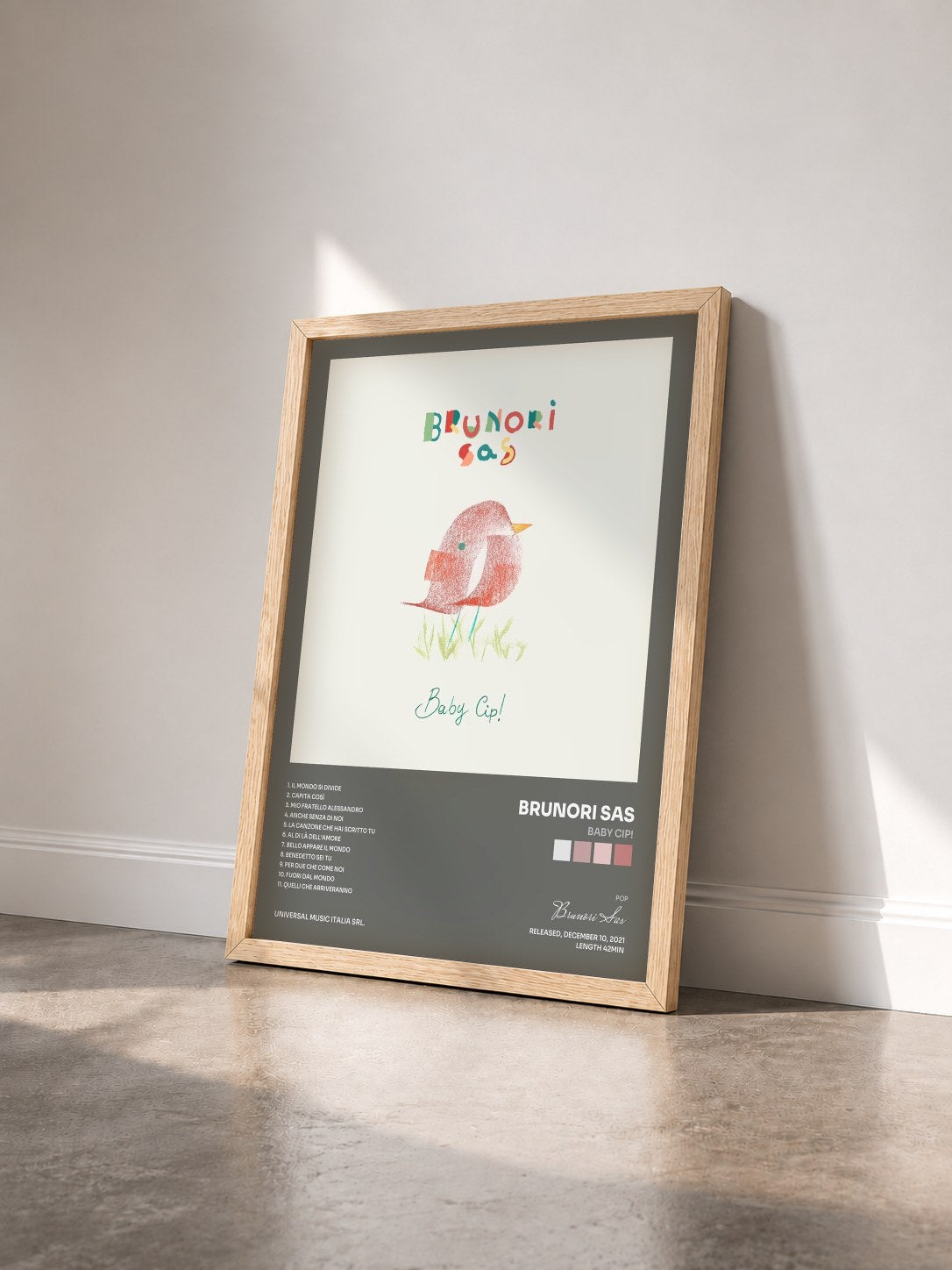 #bois Tableau de l'album Baby Cip! de Brunori Sas vu de trois quarts, cadre en bois brut