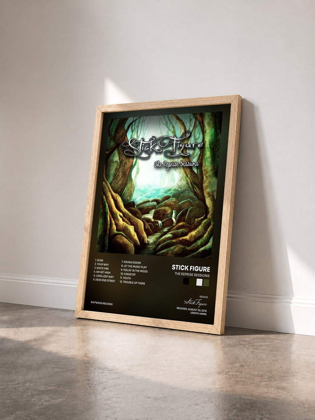 #bois Tableau de l'album The Reprise Sessions de Stick Figure vu de trois quarts, cadre en bois brut