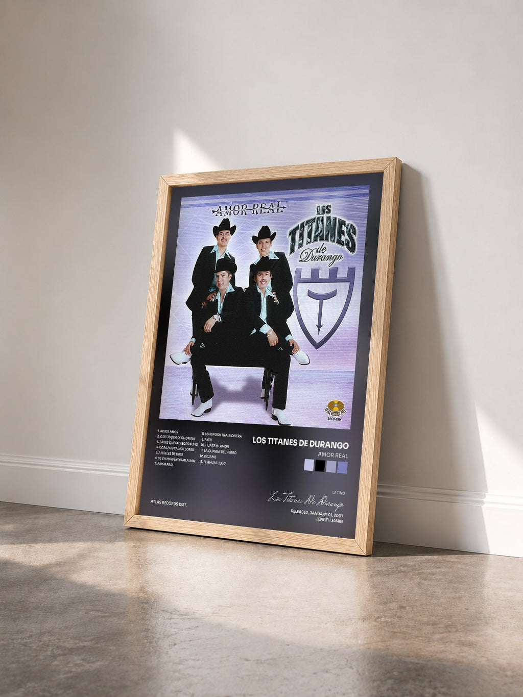 #bois Tableau de l'album Amor Real de Los Titanes De Durango vu de trois quarts, cadre en bois brut