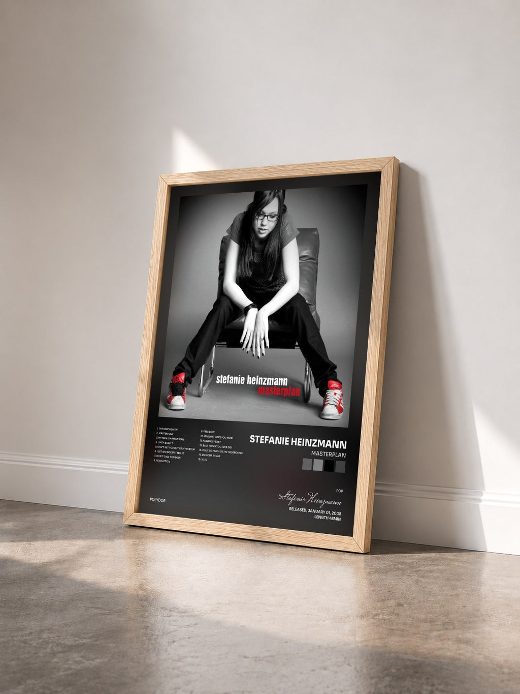 #bois Tableau de l'album Masterplan de Stefanie Heinzmann vu de trois quarts, cadre en bois brut