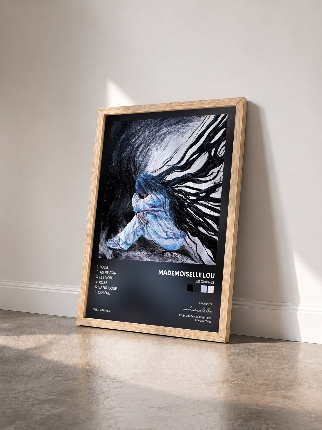 #bois Tableau de l'album LES OMBRES de mademoiselle lou vu de trois quarts, cadre en bois brut