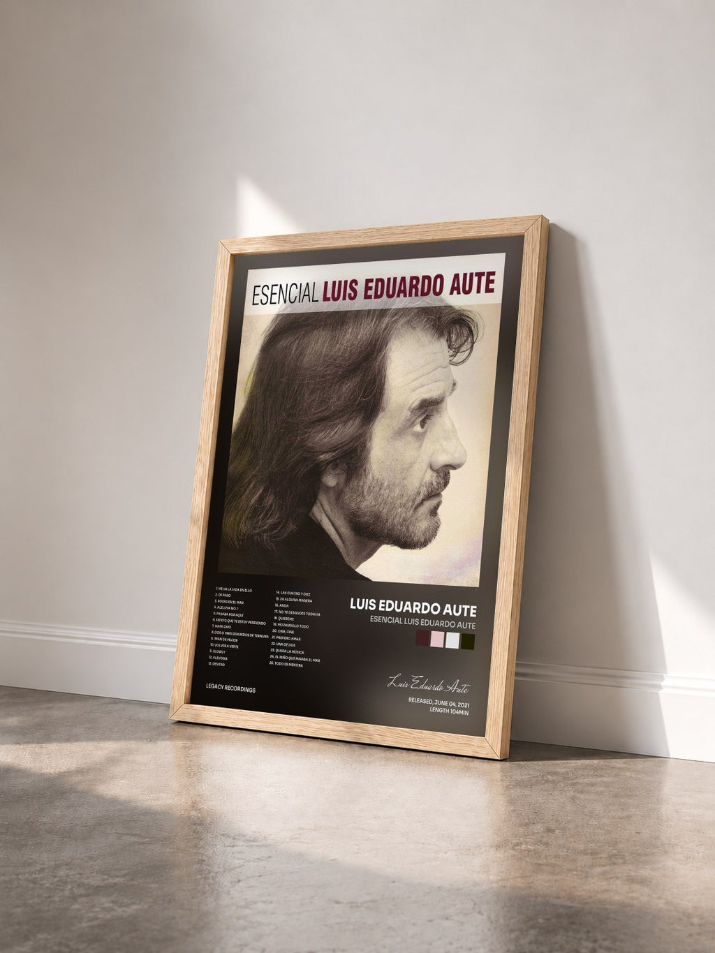 #bois Tableau de l'album Esencial Luis Eduardo Aute de Luis Eduardo Aute vu de trois quarts, cadre en bois brut