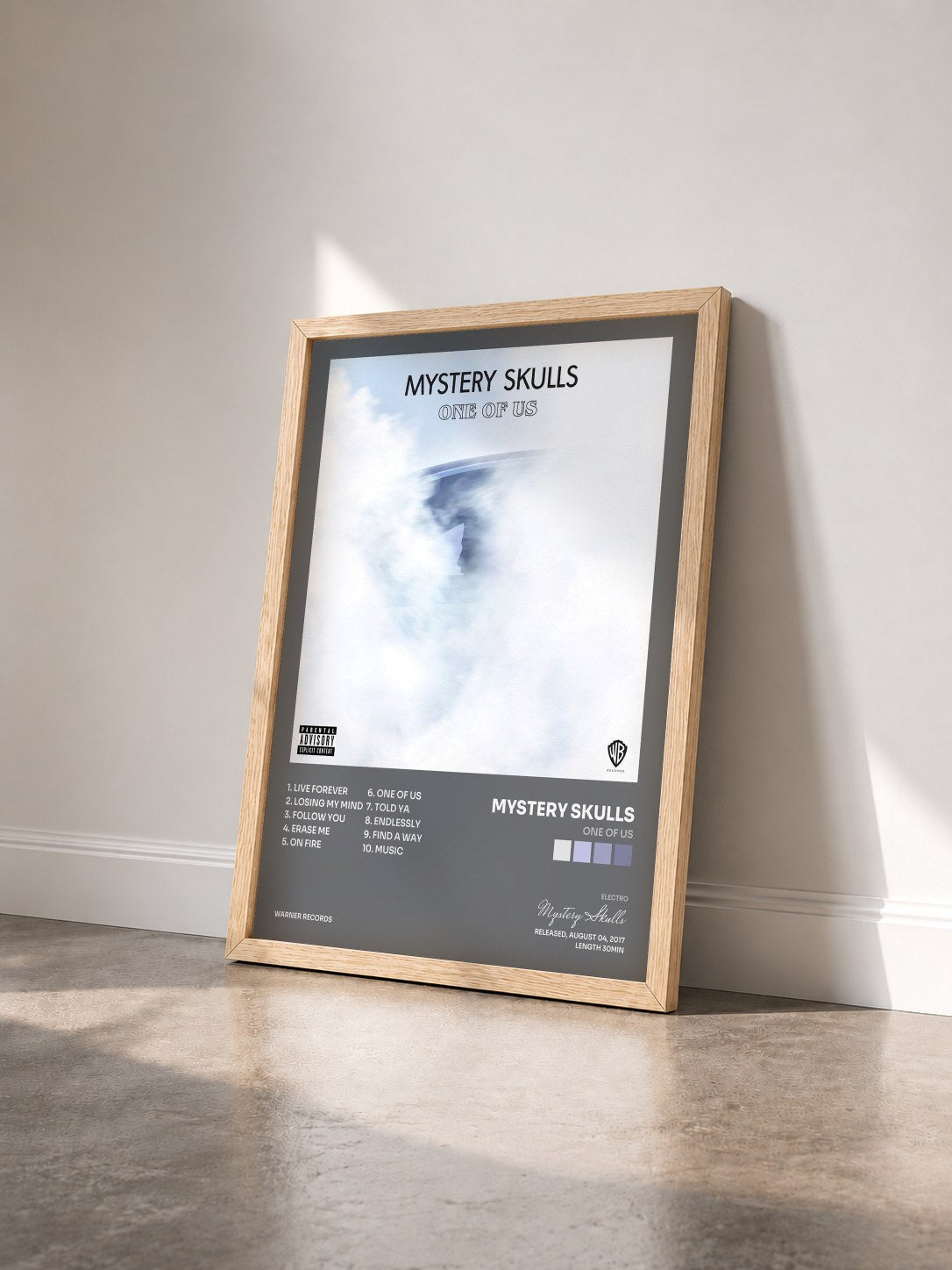 #bois Tableau de l'album One of Us de Mystery Skulls vu de trois quarts, cadre en bois brut