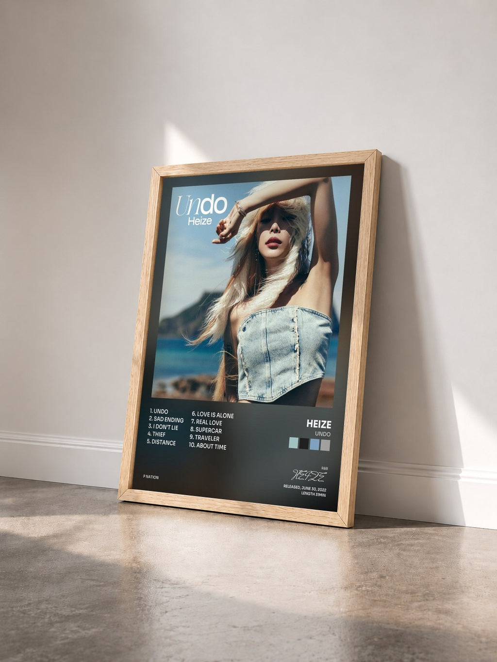 #bois Tableau de l'album Undo de HEIZE vu de trois quarts, cadre en bois brut