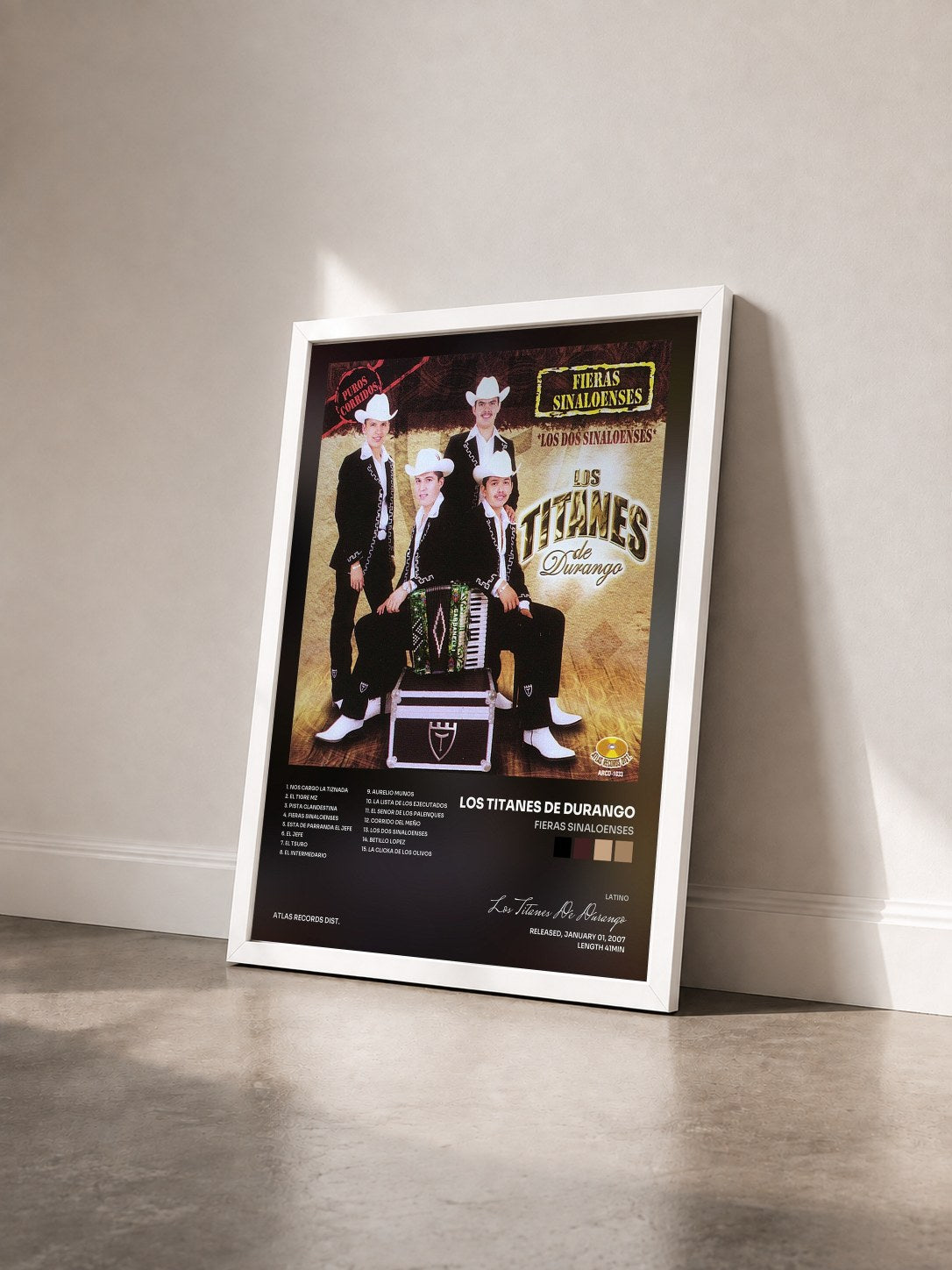 #blanc Tableau de l'album Fieras Sinaloenses de Los Titanes De Durango vu de trois quarts, cadre blanc