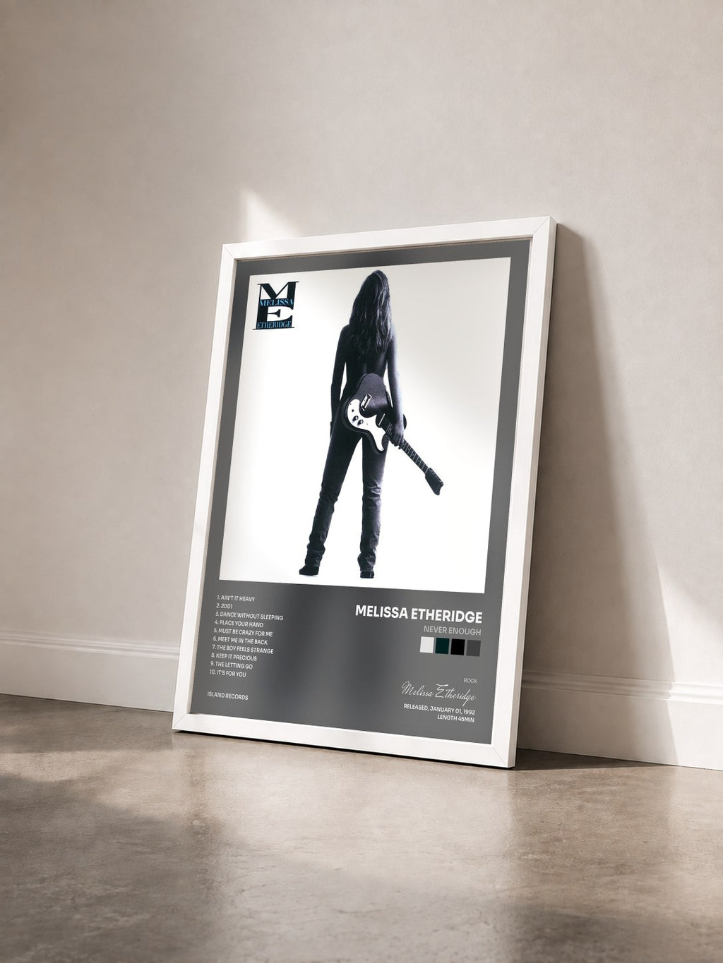 #blanc Tableau de l'album Never Enough de Melissa Etheridge vu de trois quarts, cadre blanc