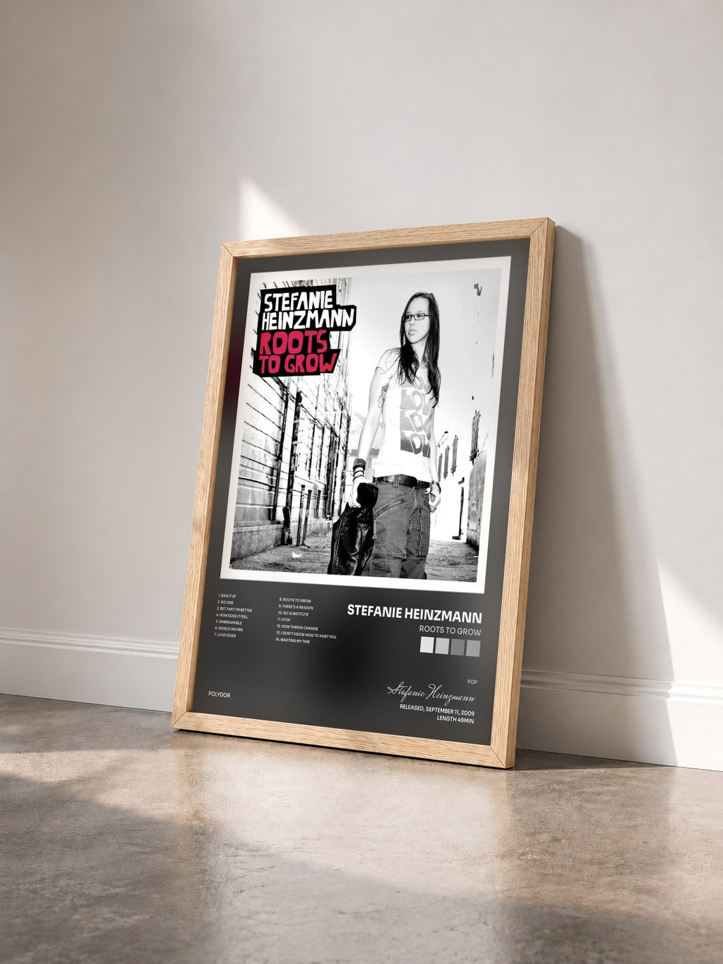 #bois Tableau de l'album Roots To Grow de Stefanie Heinzmann vu de trois quarts, cadre en bois brut