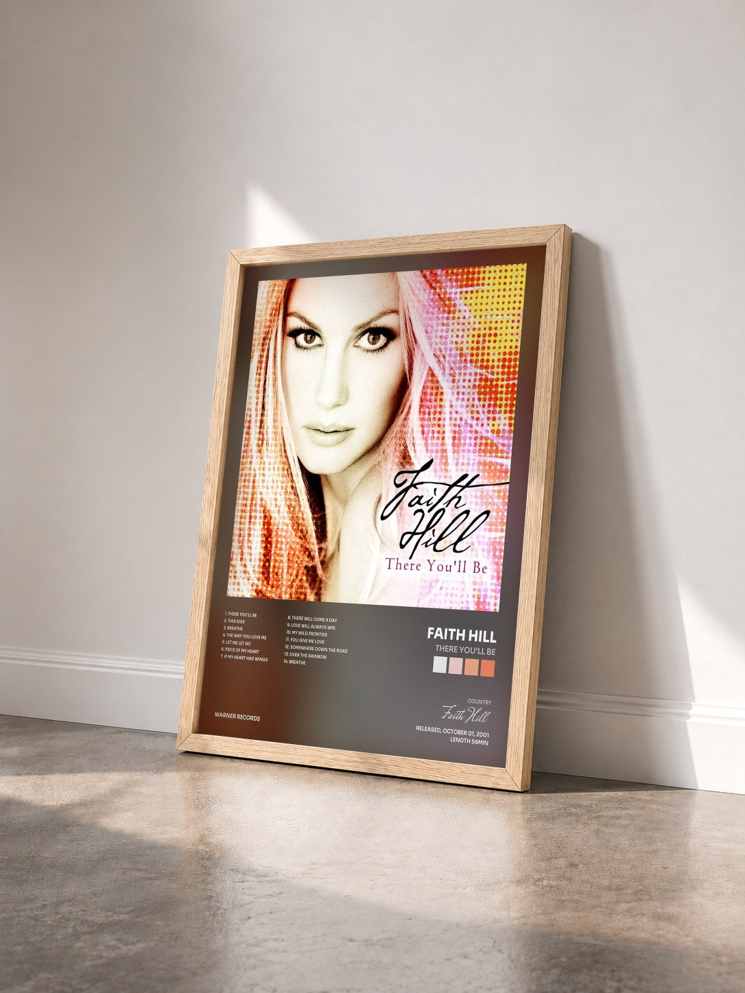 #bois Tableau de l'album There You'll Be de Faith Hill vu de trois quarts, cadre en bois brut