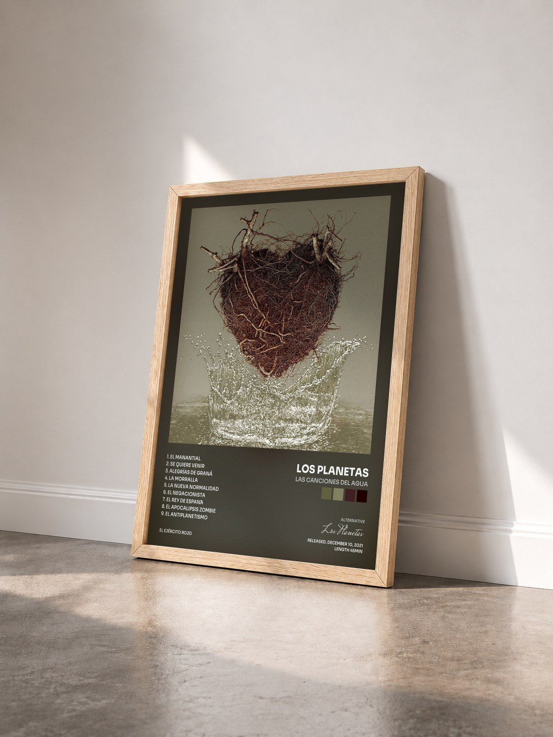 #bois Tableau de l'album Las Canciones del Agua de Los Planetas vu de trois quarts, cadre en bois brut