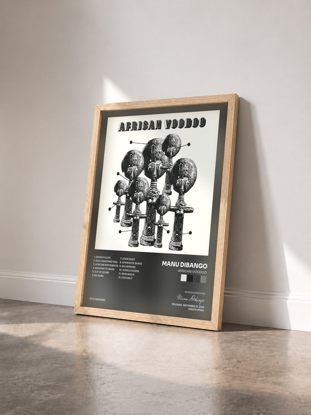 #bois Tableau de l'album African Voodoo de Manu Dibango vu de trois quarts, cadre en bois brut