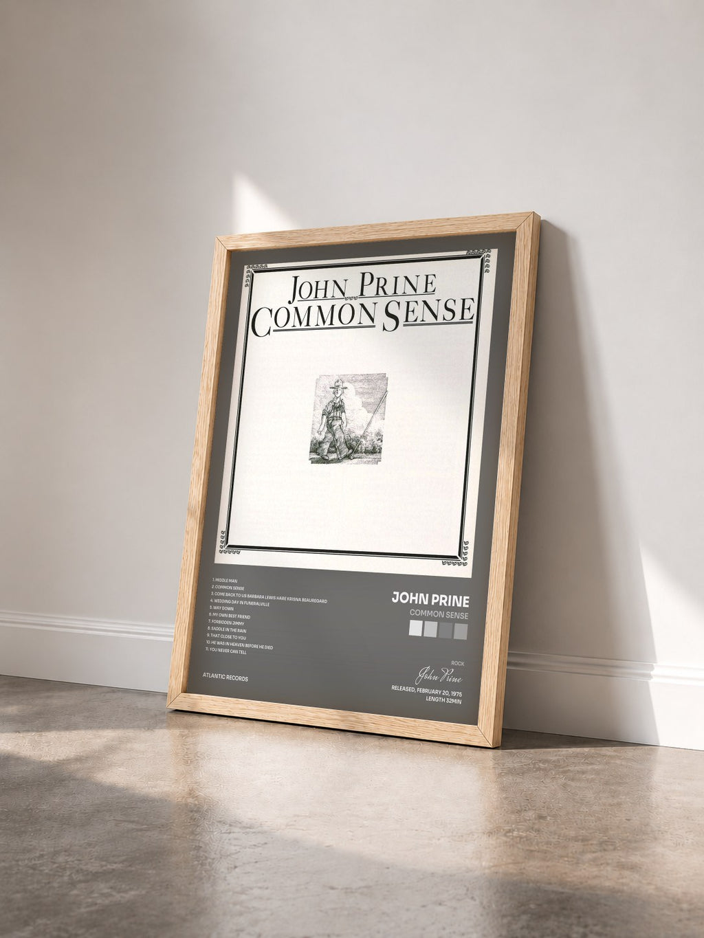 #bois Tableau de l'album Common Sense de John Prine vu de trois quarts, cadre en bois brut