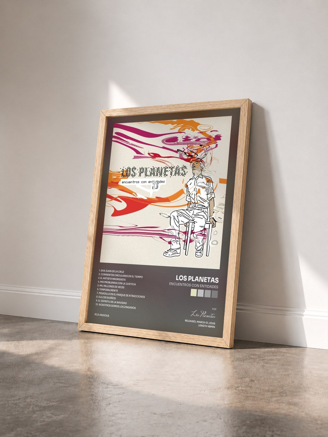 #bois Tableau de l'album Encuentros con entidades de Los Planetas vu de trois quarts, cadre en bois brut