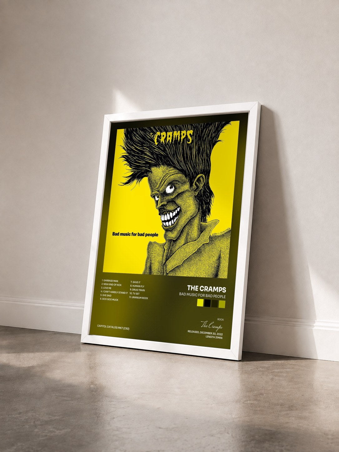 #blanc Tableau de l'album Bad Music For Bad People de The Cramps vu de trois quarts, cadre blanc