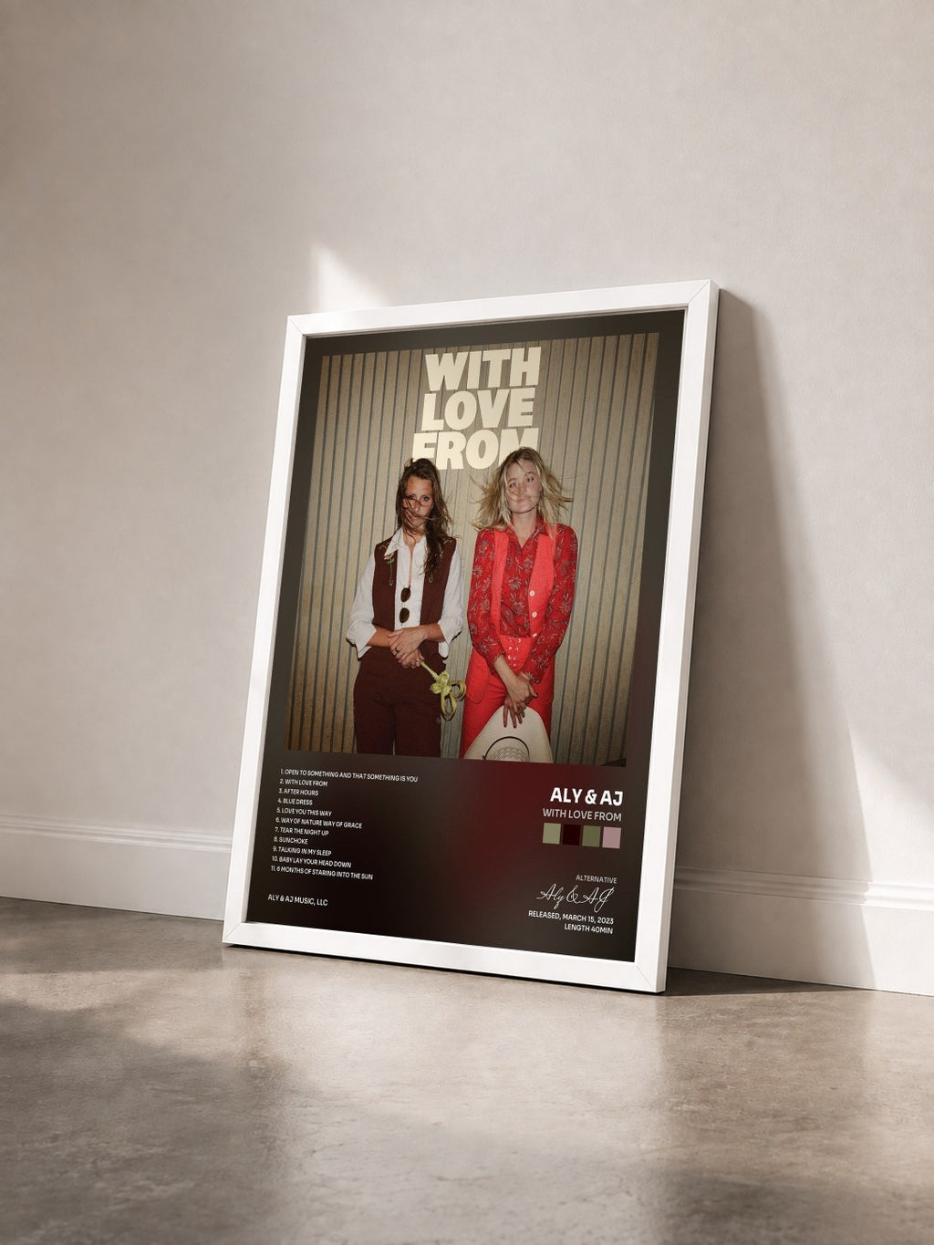#blanc Tableau de l'album With Love From de Aly & AJ vu de trois quarts, cadre blanc