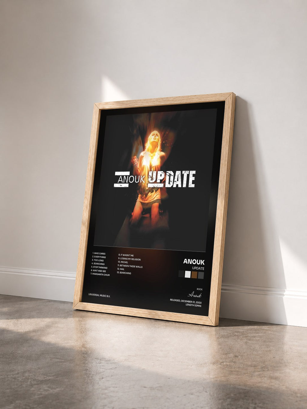 #bois Tableau de l'album Update de Anouk vu de trois quarts, cadre en bois brut