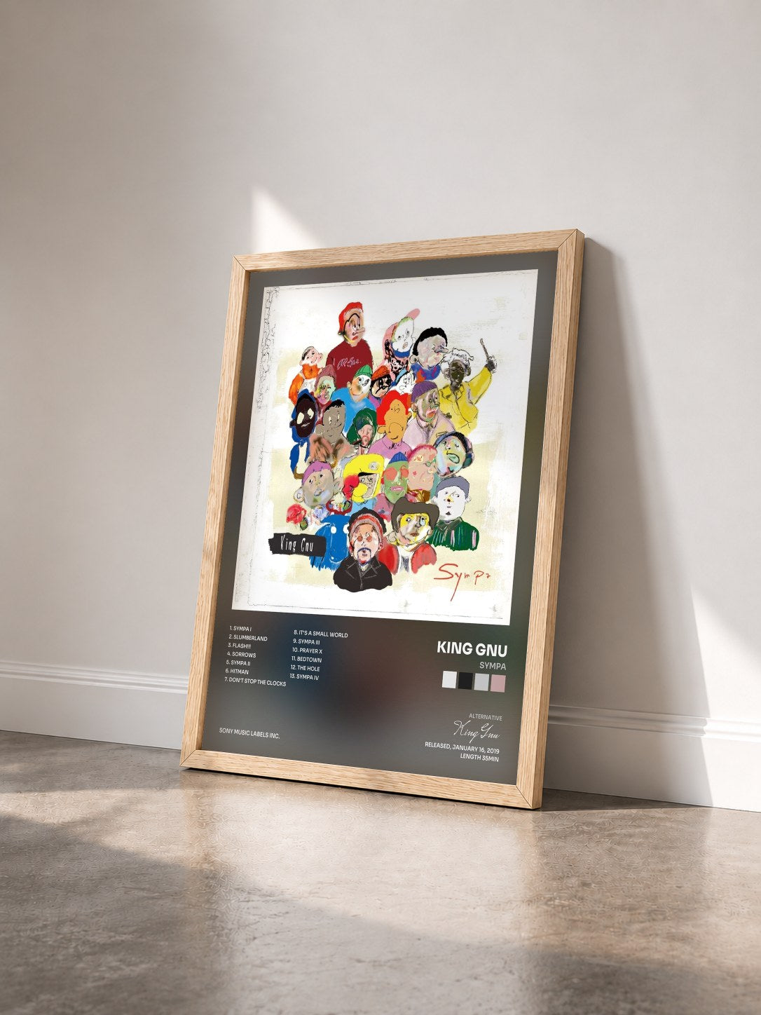 #bois Tableau de l'album Sympa de King Gnu vu de trois quarts, cadre en bois brut