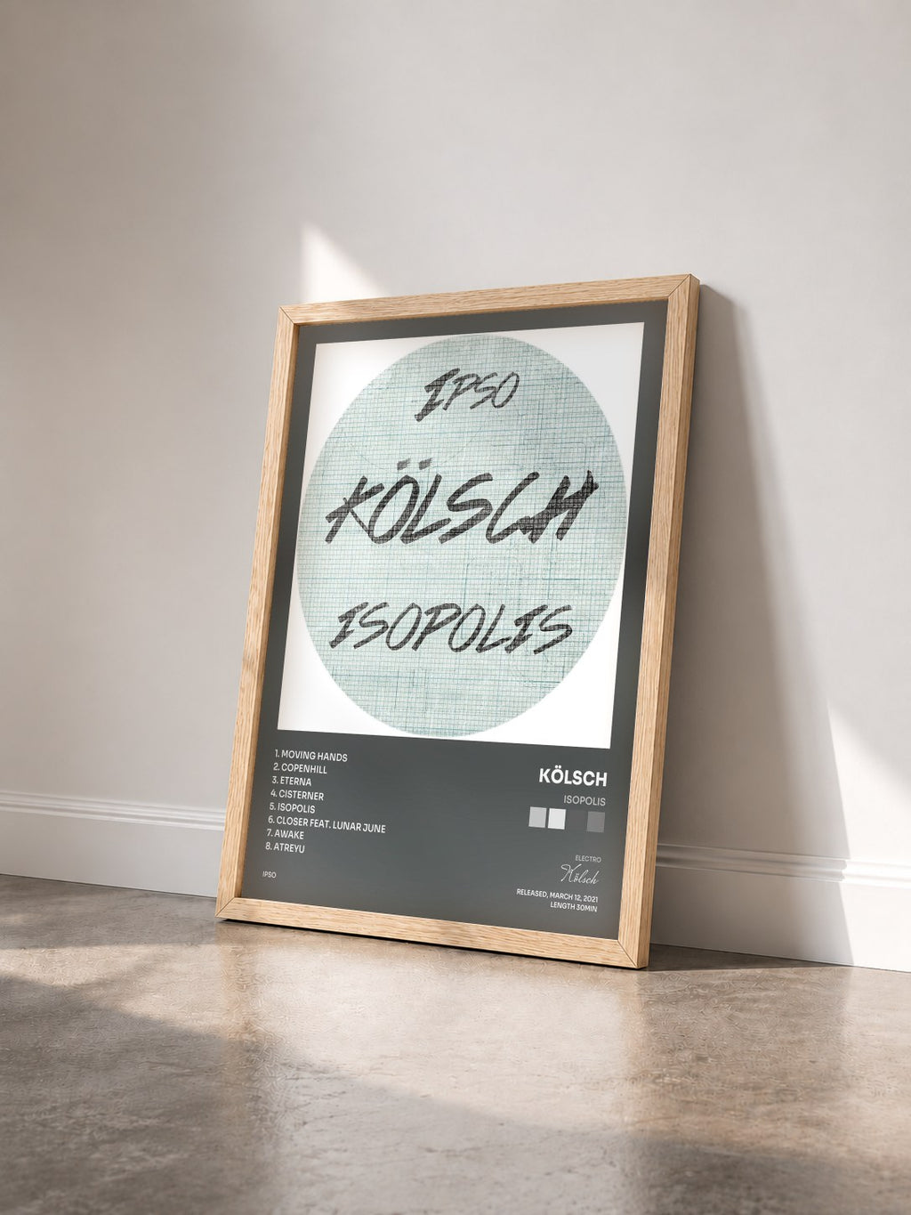 #bois Tableau de l'album Isopolis de Kölsch vu de trois quarts, cadre en bois brut