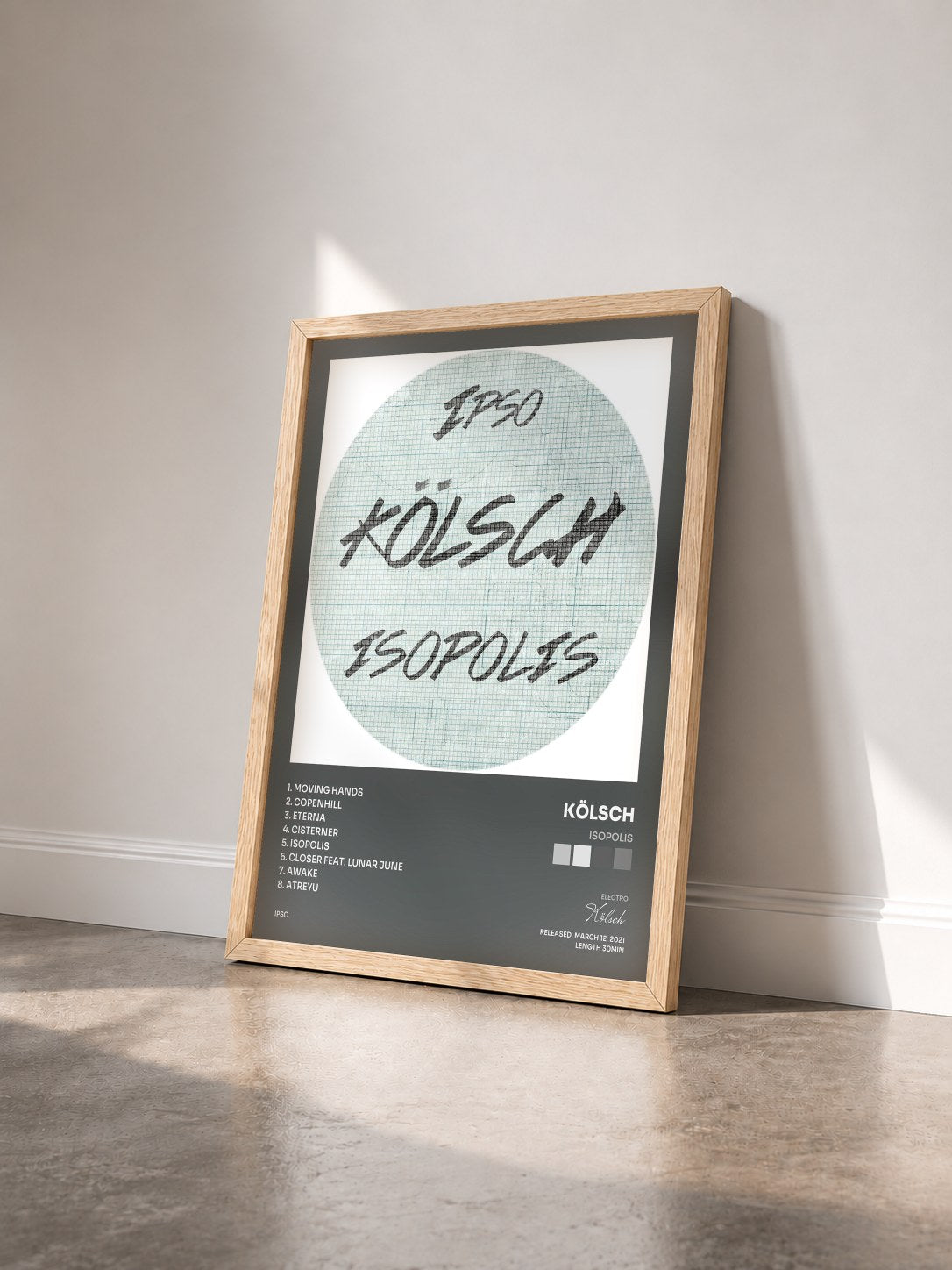#bois Tableau de l'album Isopolis de Kölsch vu de trois quarts, cadre en bois brut