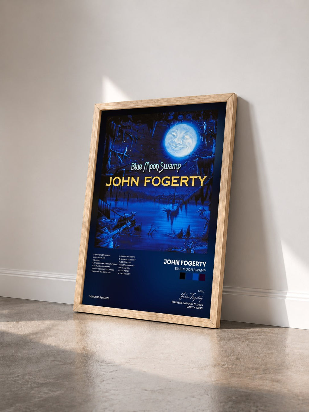 #bois Tableau de l'album Blue Moon Swamp de John Fogerty vu de trois quarts, cadre en bois brut