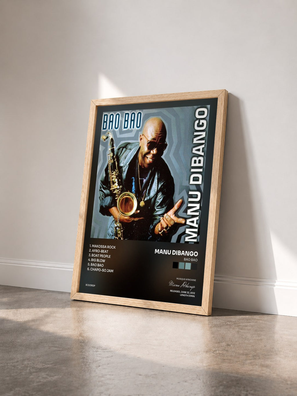 #bois Tableau de l'album Bao Bao de Manu Dibango vu de trois quarts, cadre en bois brut