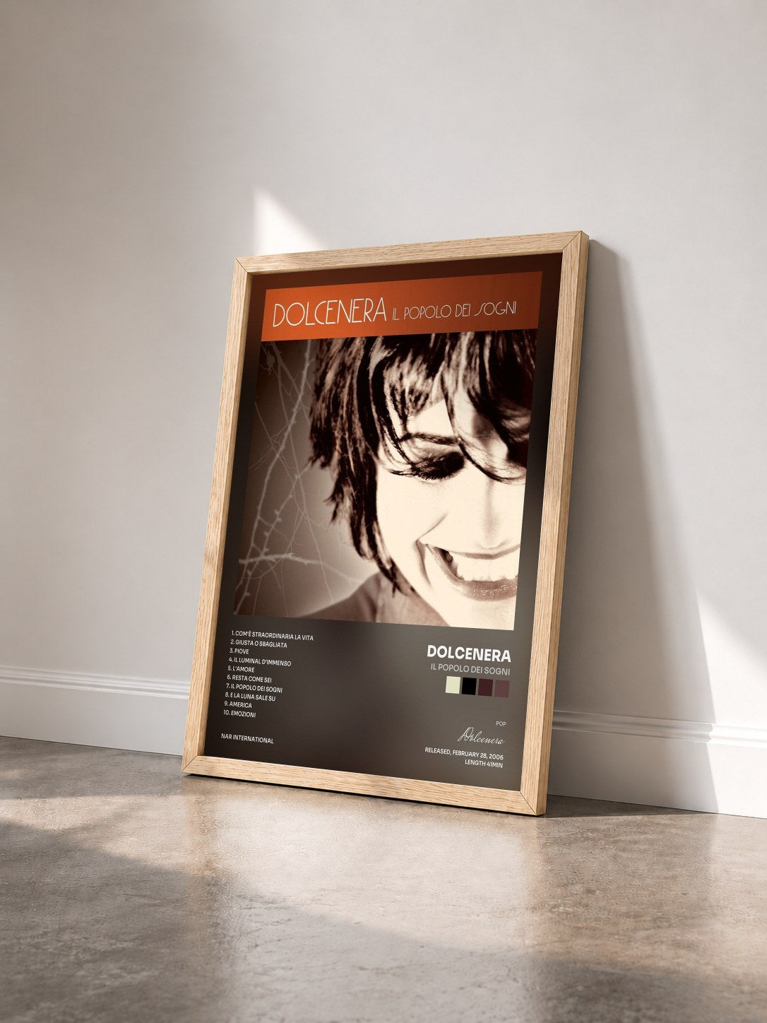 #bois Tableau de l'album Il Popolo Dei Sogni de Dolcenera vu de trois quarts, cadre en bois brut