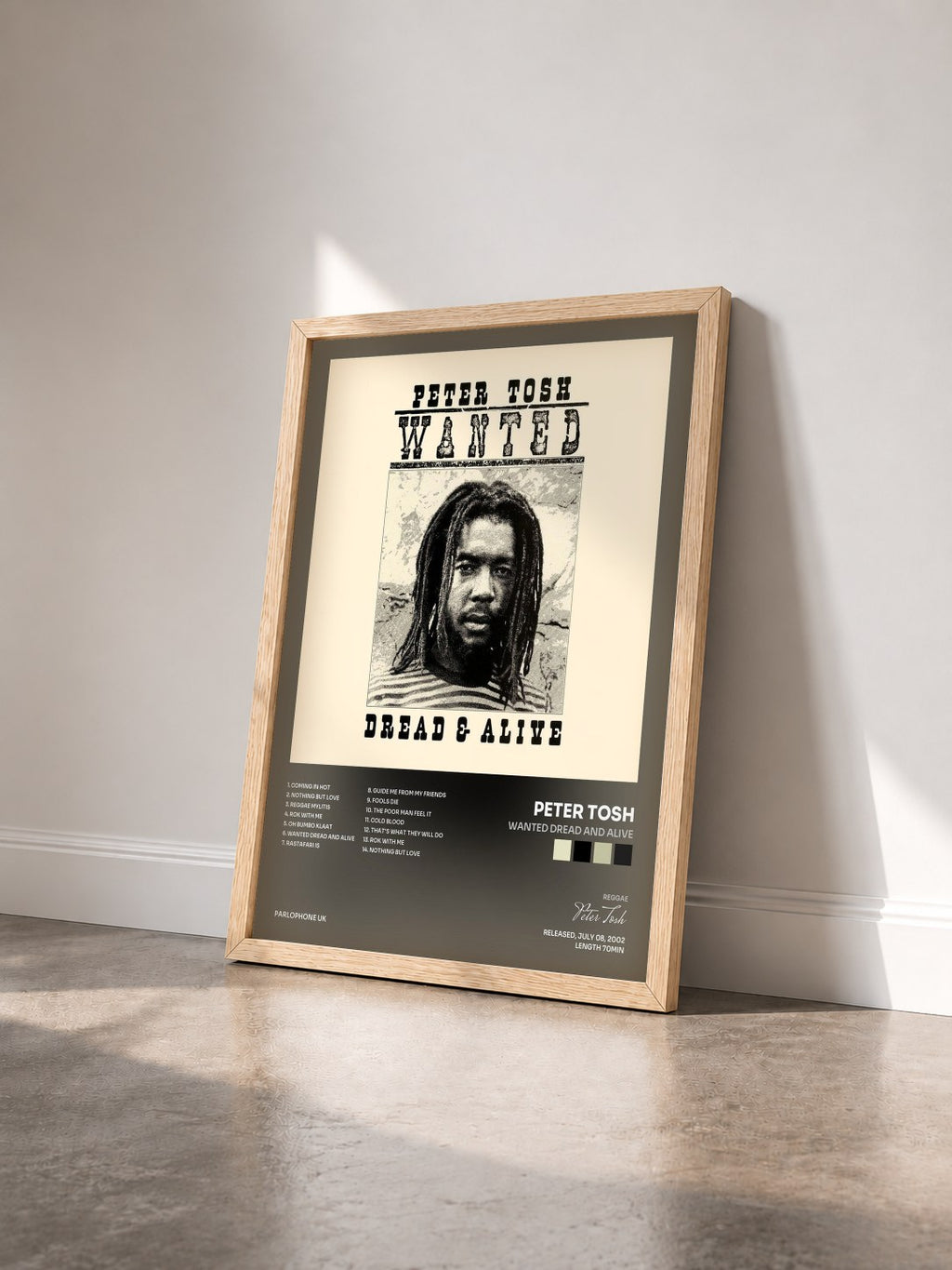 #bois Tableau de l'album Wanted Dread and Alive de Peter Tosh vu de trois quarts, cadre en bois brut
