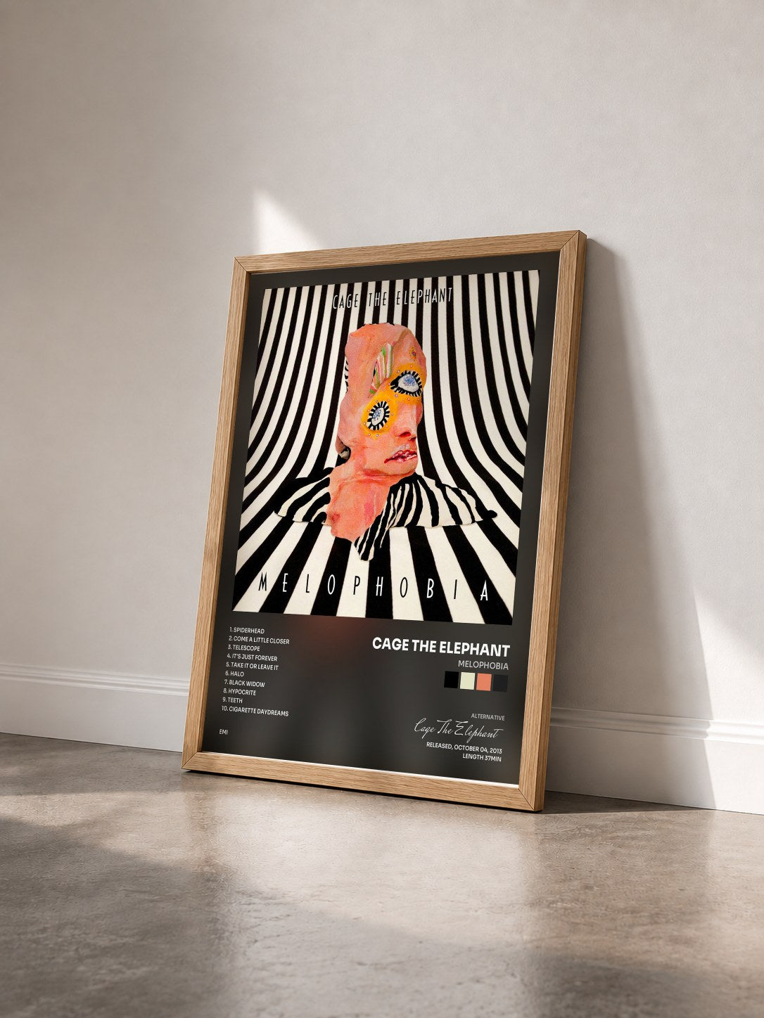 #bois Tableau de l'album Melophobia de Cage The Elephant vu de trois quarts, cadre en bois brut
