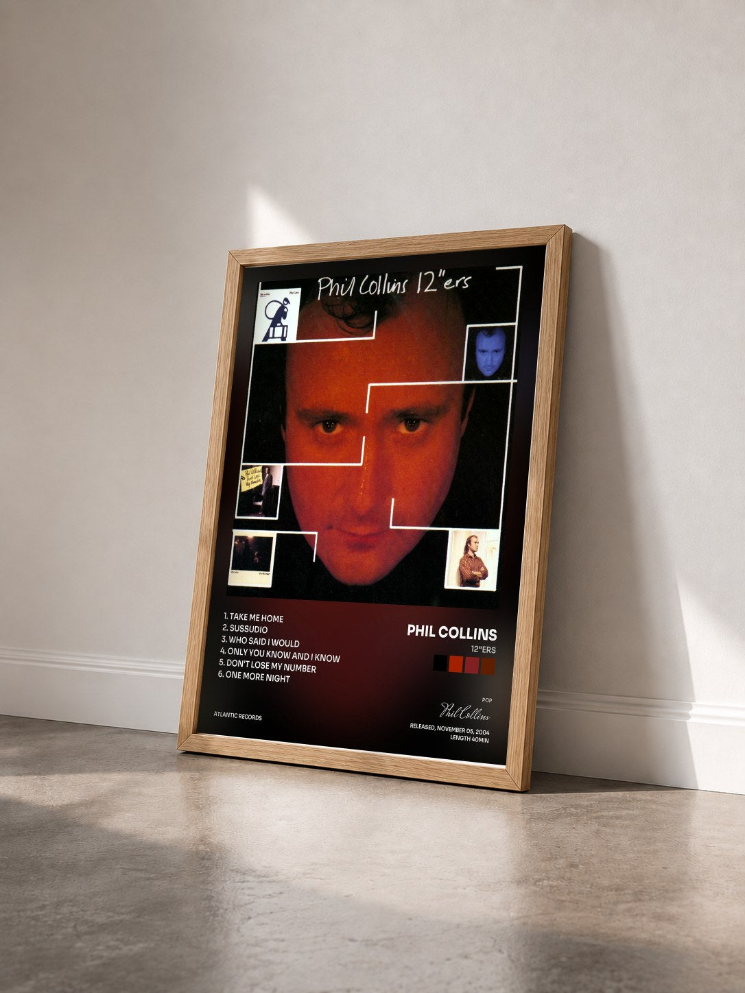 #bois Tableau de l'album 12"ers de Phil Collins vu de trois quarts, cadre en bois brut