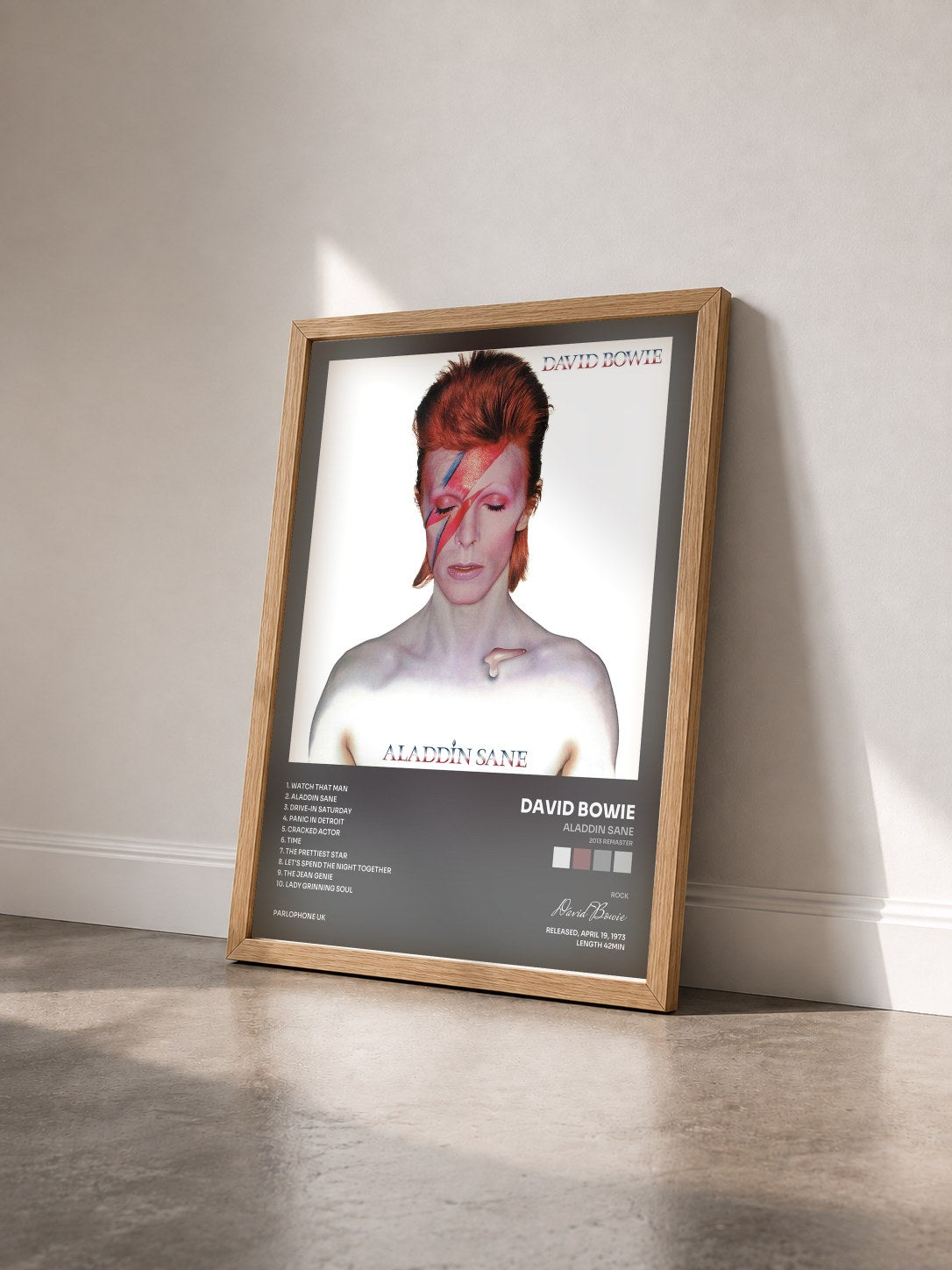 #bois Tableau de l'album Aladdin Sane (2013 Remaster) de David Bowie vu de trois quarts, cadre en bois brut