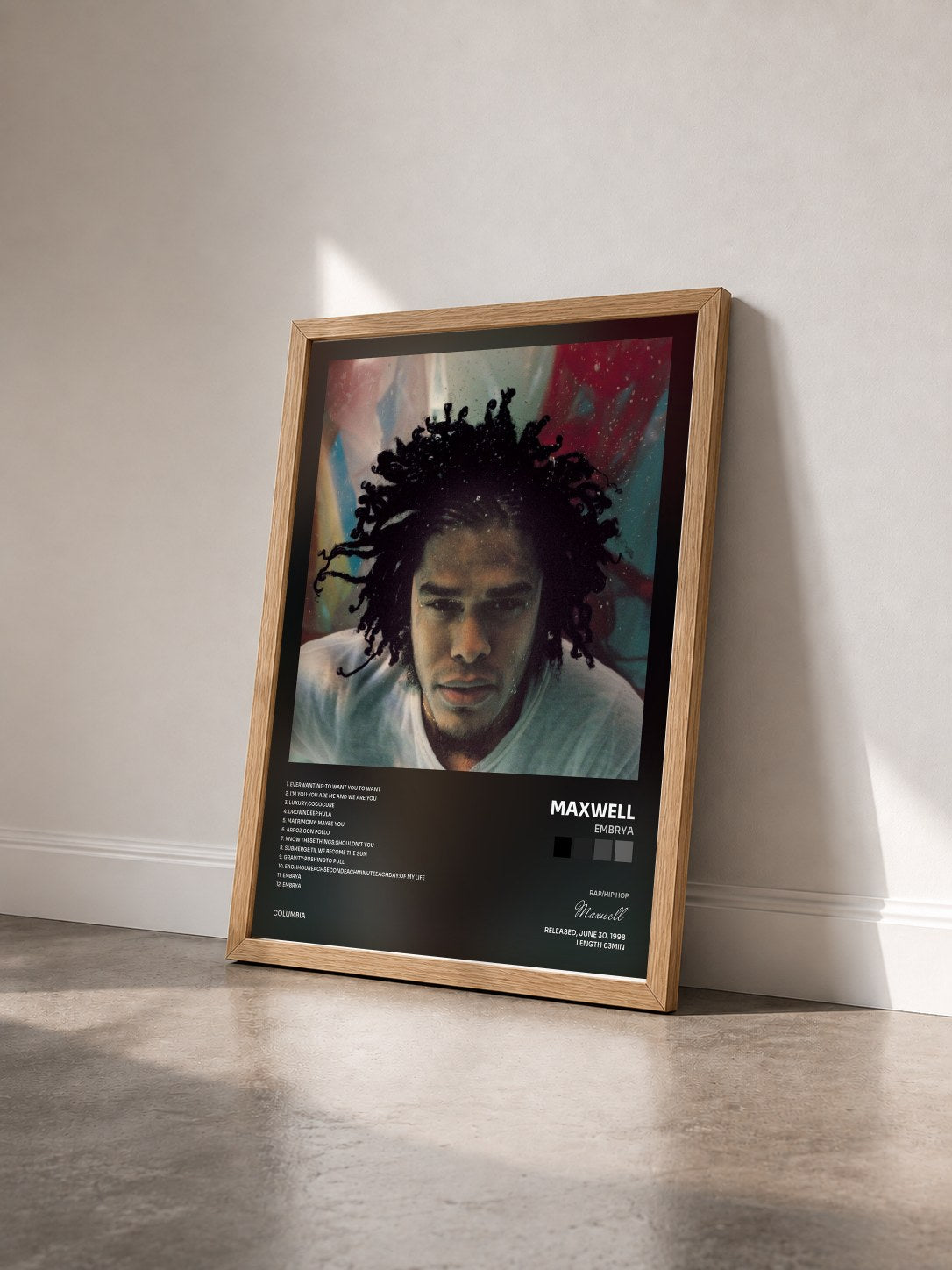 #bois Tableau de l'album Embrya de Maxwell vu de trois quarts, cadre en bois brut