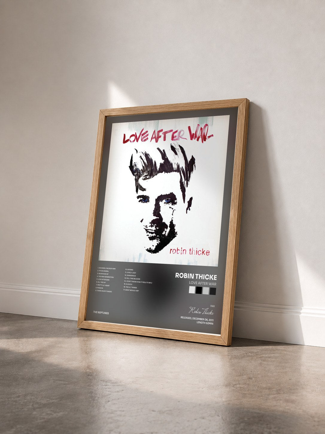 #bois Tableau de l'album Love After War de Robin Thicke vu de trois quarts, cadre en bois brut