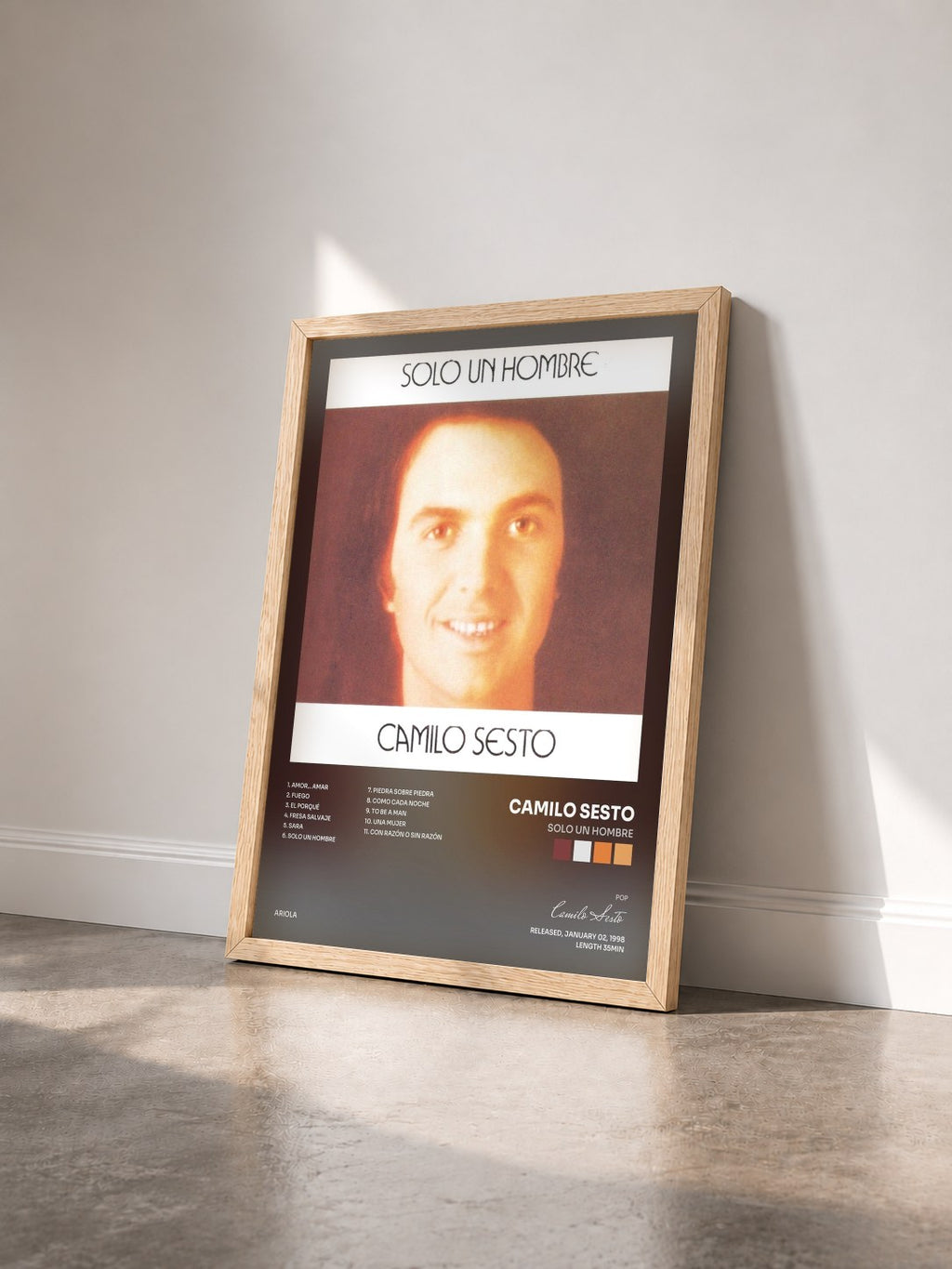 #bois Tableau de l'album Solo un Hombre de Camilo Sesto vu de trois quarts, cadre en bois brut