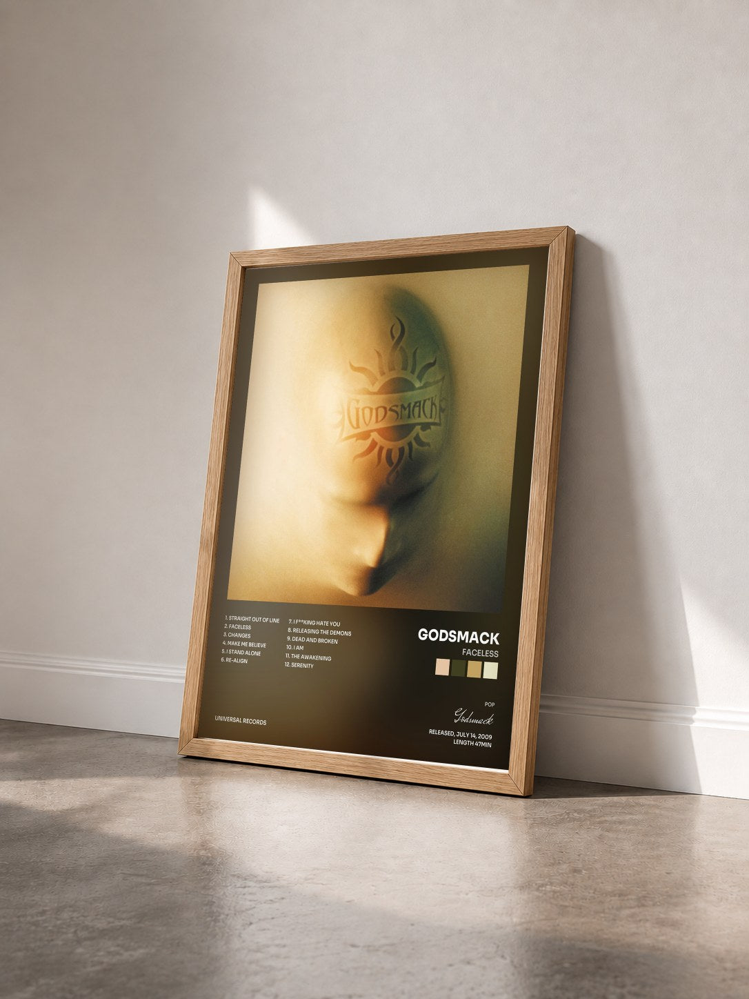 #bois Tableau de l'album Faceless de Godsmack vu de trois quarts, cadre en bois brut