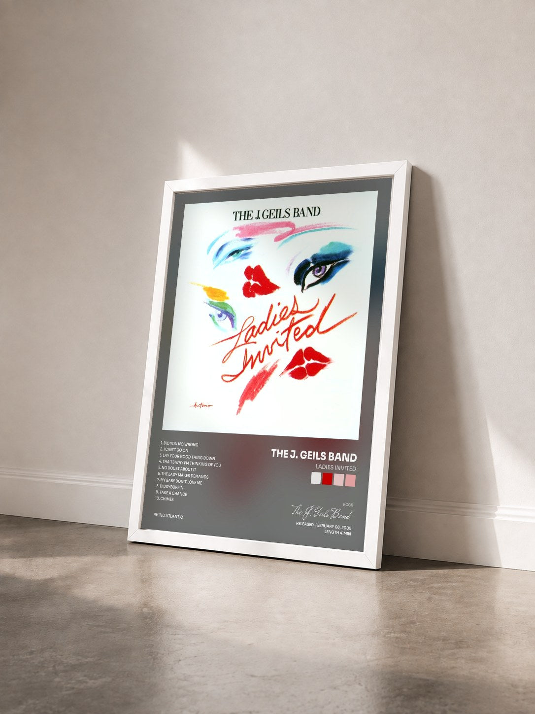 #blanc Tableau de l'album Ladies Invited de The J. Geils Band vu de trois quarts, cadre blanc