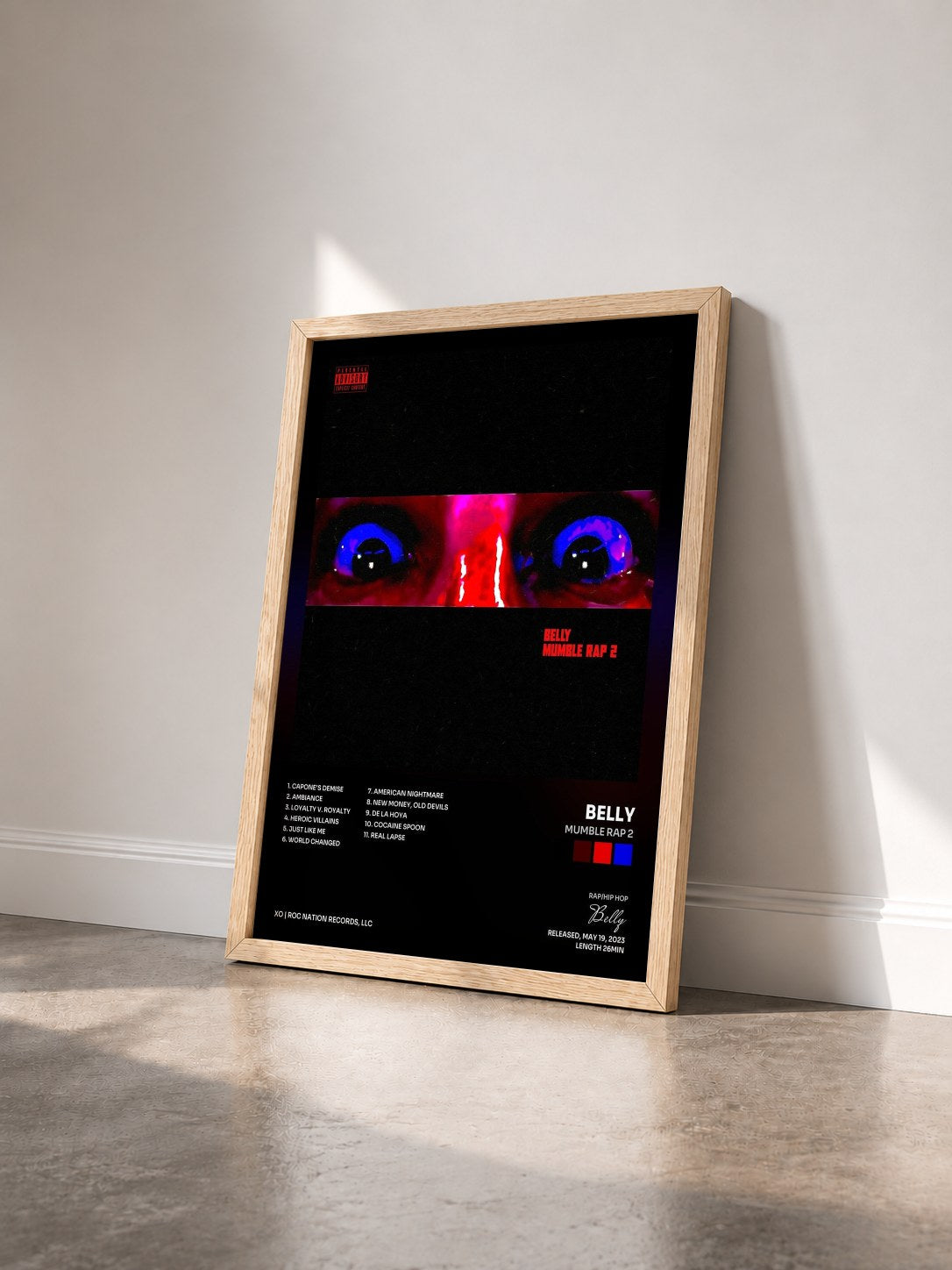 #bois Tableau de l'album Mumble Rap 2 de Belly vu de trois quarts, cadre en bois brut