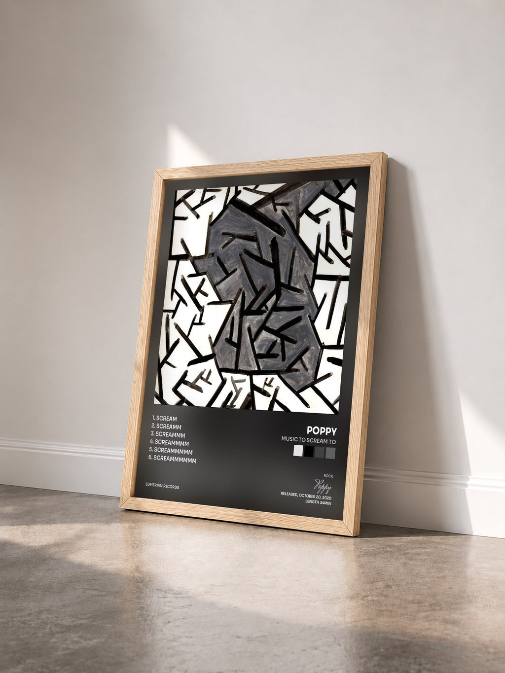 #bois Tableau de l'album Music To Scream To de Poppy vu de trois quarts, cadre en bois brut