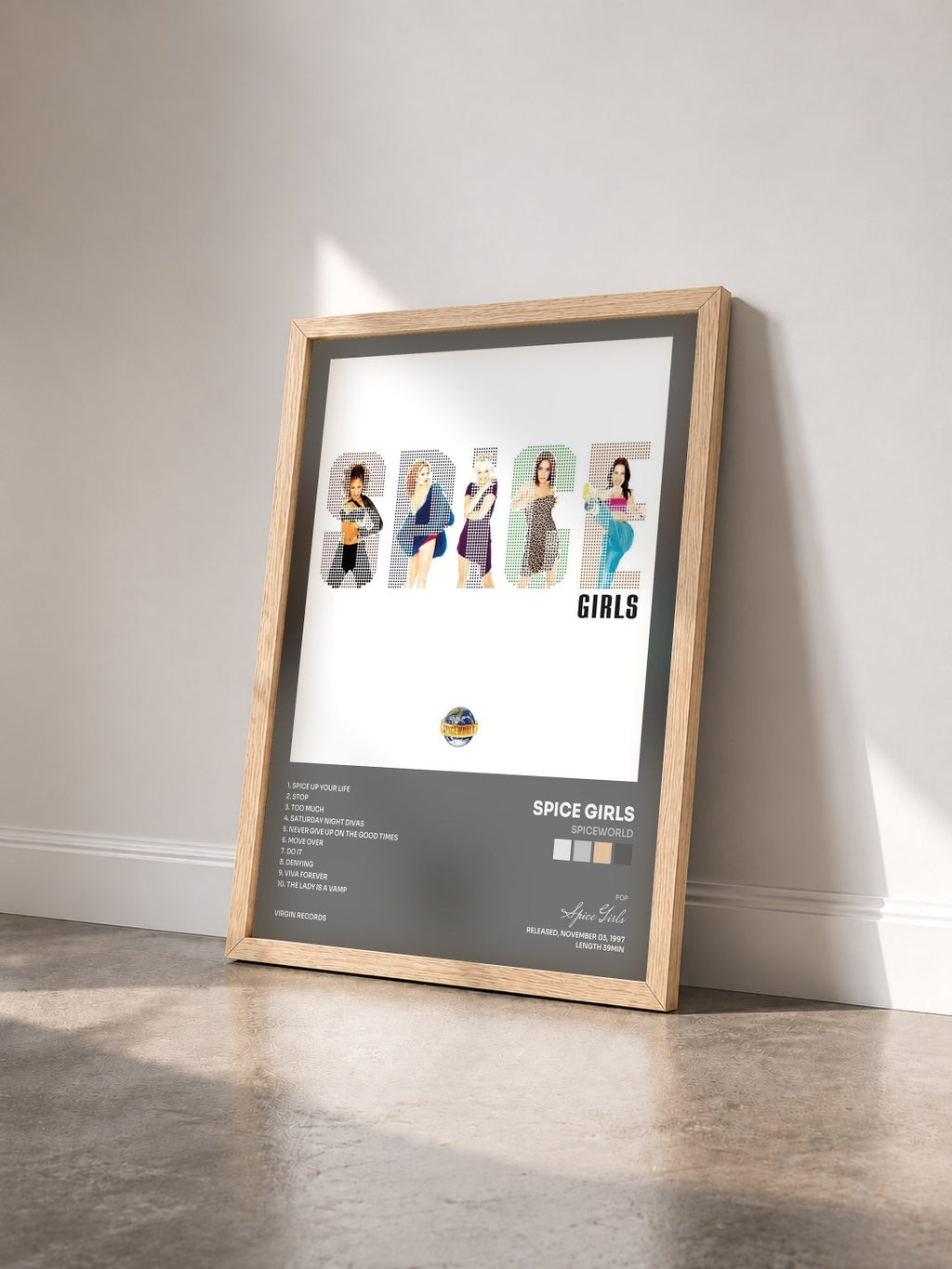 #bois Tableau de l'album Spiceworld de Spice Girls vu de trois quarts, cadre en bois brut