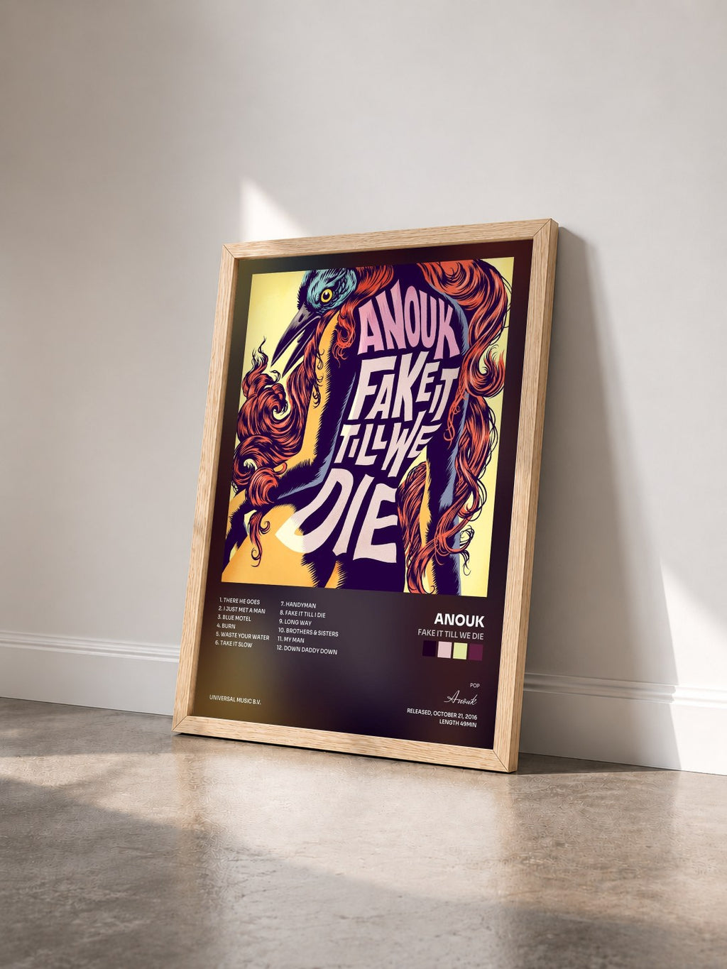 #bois Tableau de l'album Fake It Till We Die de Anouk vu de trois quarts, cadre en bois brut