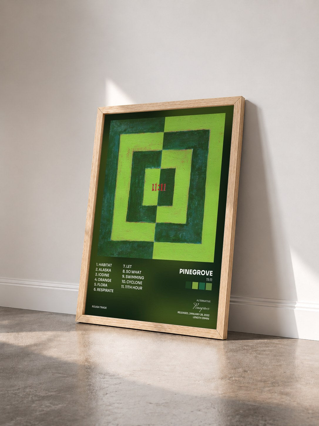 #bois Tableau de l'album 11:11 de Pinegrove vu de trois quarts, cadre en bois brut