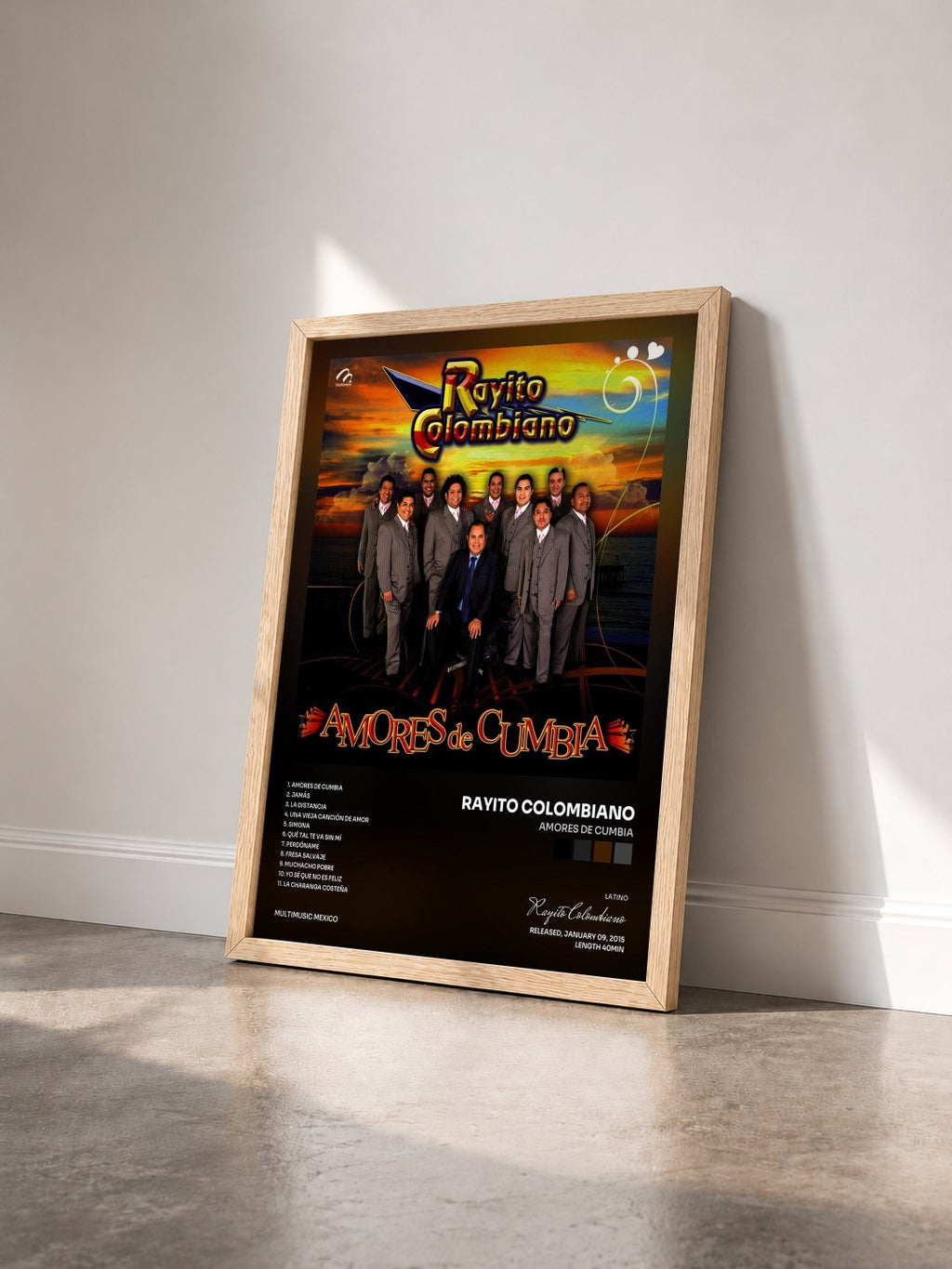#bois Tableau de l'album Amores de Cumbia de Rayito Colombiano vu de trois quarts, cadre en bois brut