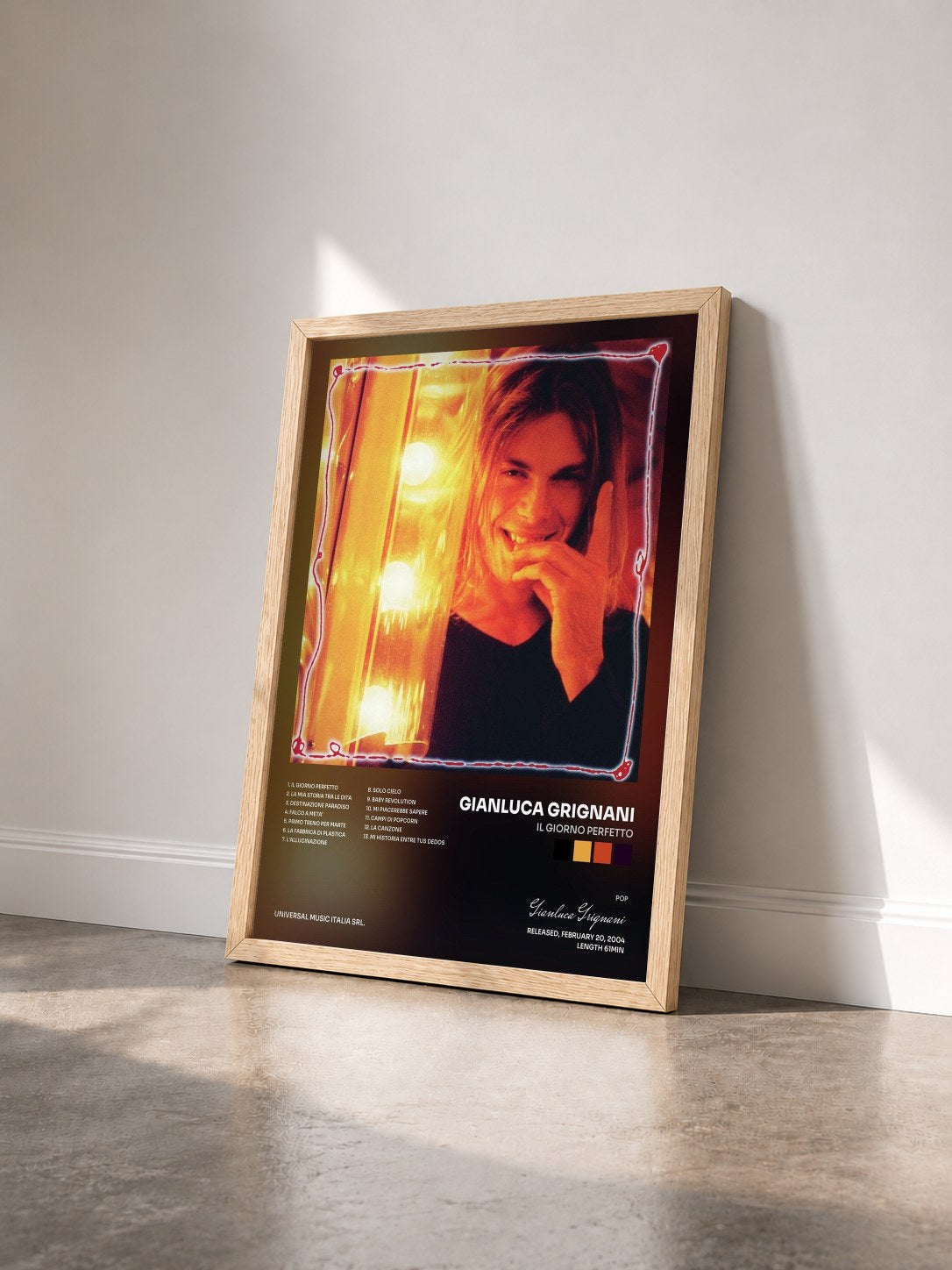 #bois Tableau de l'album Il Giorno Perfetto de Gianluca Grignani vu de trois quarts, cadre en bois brut